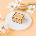 Load image into Gallery viewer, a mother's day card box sitting on a marble coaster surrounded by flowers