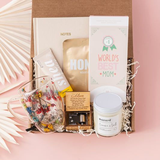 a mother's day gift box with a pink background