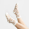 Load image into Gallery viewer, a woman's legs with leopard print socks
