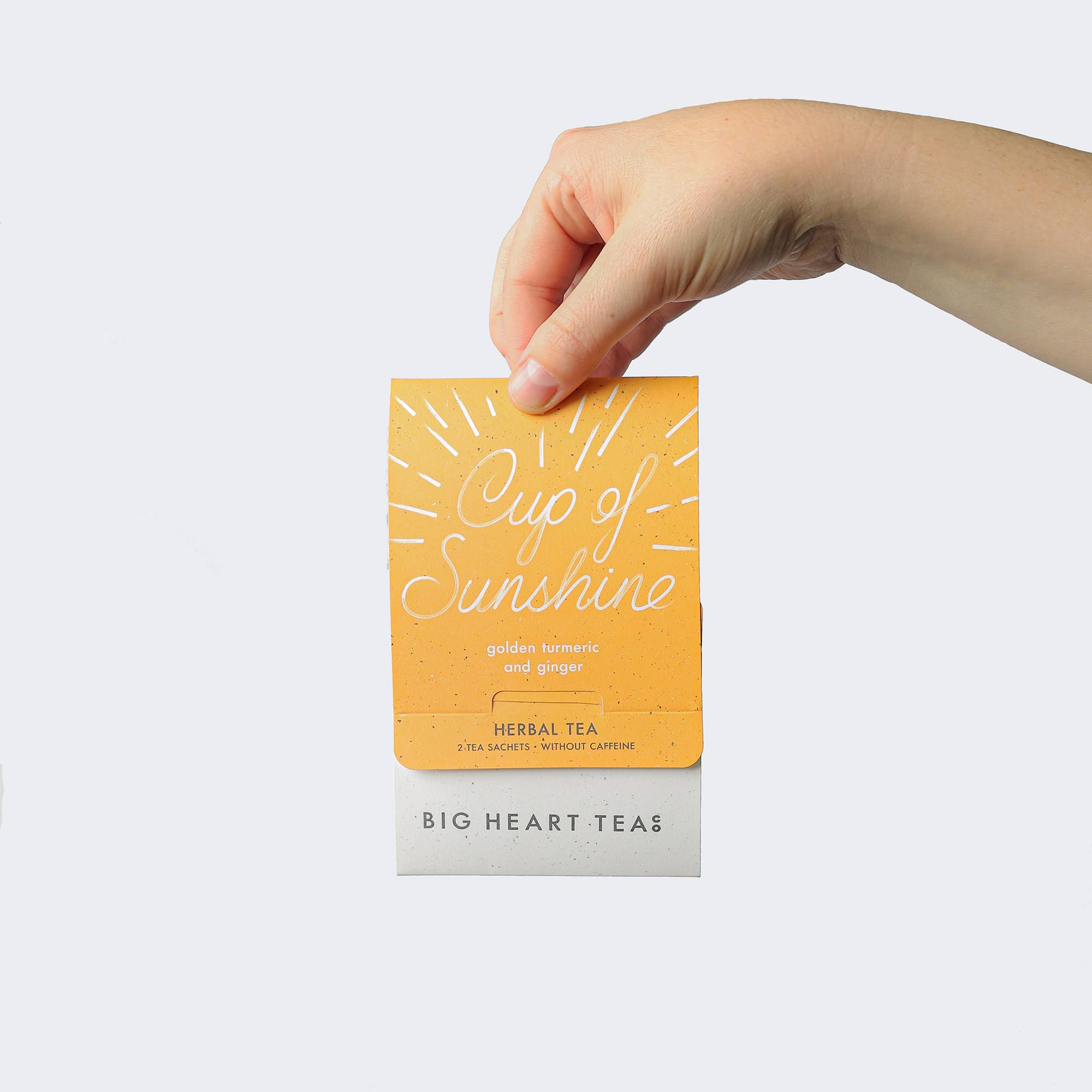 a hand holding a card that says cup of sunshine